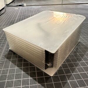 Two CD/DVD disk holders- holds 10 each